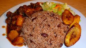 Delicious waakye with chicken stew